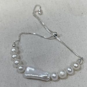 Fresh water pearls white and silver